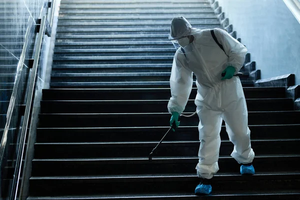 Man Protective Suit Disinfecting Staircase Underground Passage Order Prevent Spread — Stock fotografie