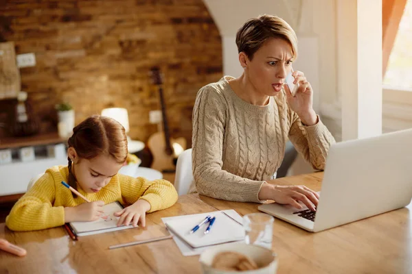 Working Mother Communicating Cell Phone Reading Shocking Mail Laptop While — Foto de Stock
