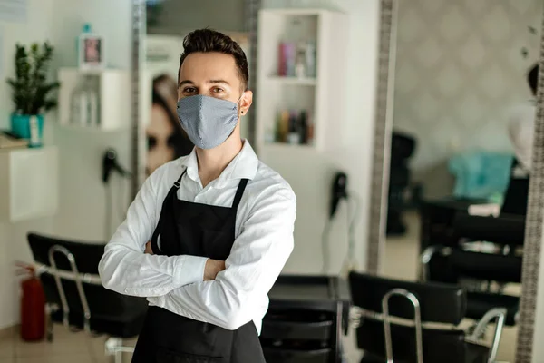 Portrait Confident Hairdresser Protective Face Mask His Hair Studio — Zdjęcie stockowe