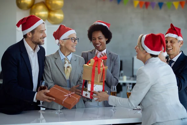 Happy Mature Businesswoman Receiving Christmas Present Her Coworkers Office Party — ストック写真