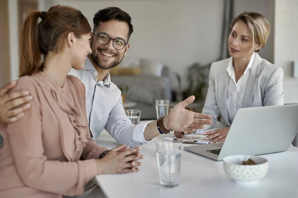 Young Happy Couple Communicating While Being Meeting Real Estate Agent — ストック写真