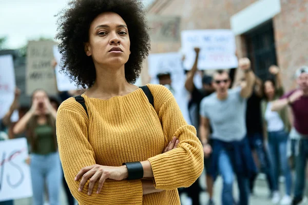 Young Confident Black Woman Crossed Arms Taking Part Protest Human — Stok fotoğraf