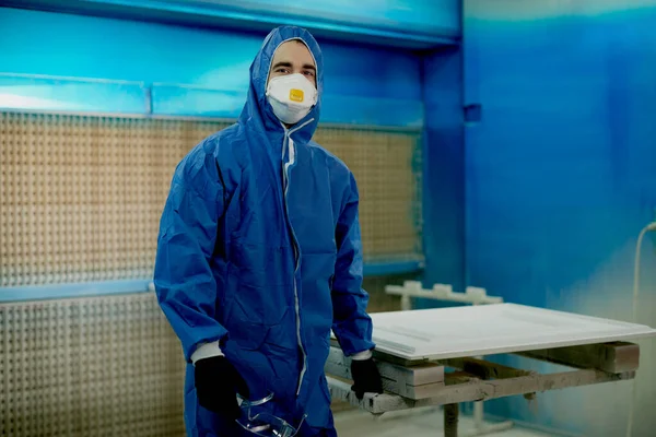 Male Worker Wearing Mask Protective Suit While Painting Processed Wood — Stock fotografie