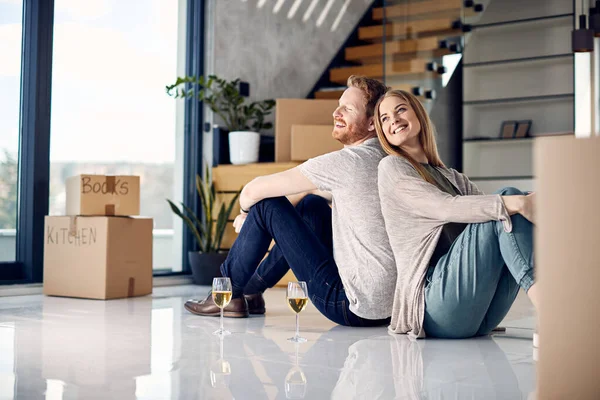 Happy Couple Sitting Back Back Enjoying Moving New Home — Stockfoto