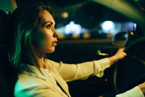 Young Woman Feeling Sad Crying While Driving Car Alone Night — Foto de Stock