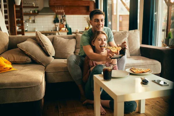 Happy Couple Eating Pizza While Watching Movie Relaxing Home —  Fotos de Stock