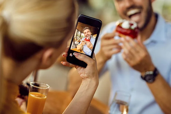 Close Man Being Photographed His Girlfriend While Eating Donut Dessert — Photo