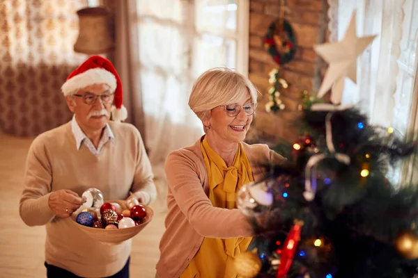 Happy Senior Woman Decorating Christmas Tree Together Home — Photo