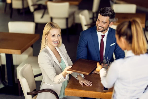 Happy Businesswoman Taking Menu Waitress While Being Her Male Colleagues — Fotografia de Stock