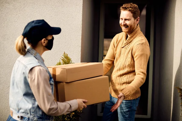Female Courier Making Home Delivery Giving Packages Happy Man Who — Stockfoto