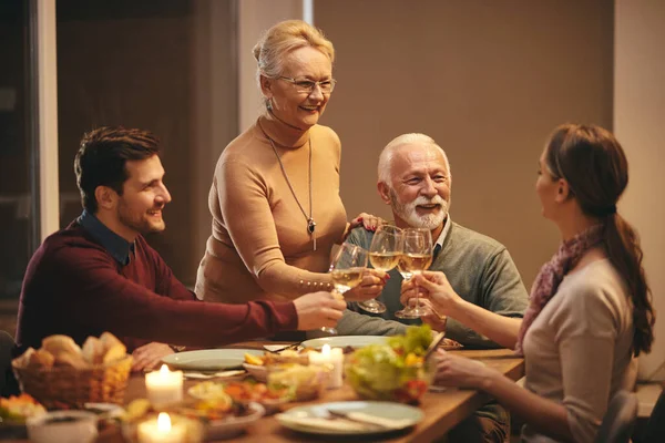 Happy Family Celebrating Toasting Wine Meal Dining Table — Zdjęcie stockowe