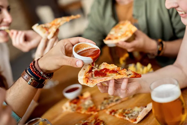 Close Man Pouring Ketchup Friend Slice Pizza — Photo