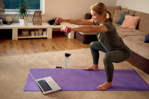 Happy Athletic Woman Online Exercise Class Laptop Using Dumbbells While —  Fotos de Stock