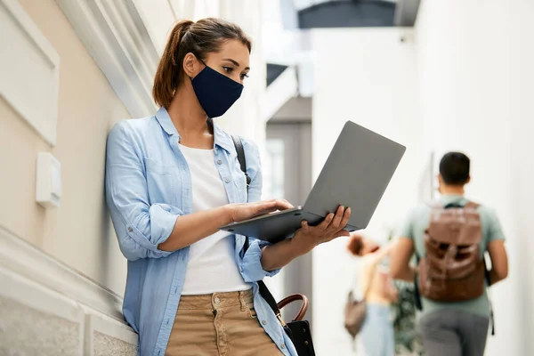 Female Student Surfing Net Laptop While Wearing Face Mask University — Foto Stock