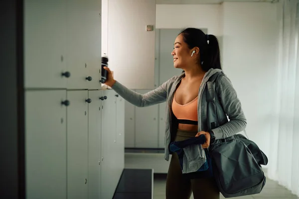 Happy Asian Athletic Woman Taking Her Stuff Locker Finishing Sports — Photo