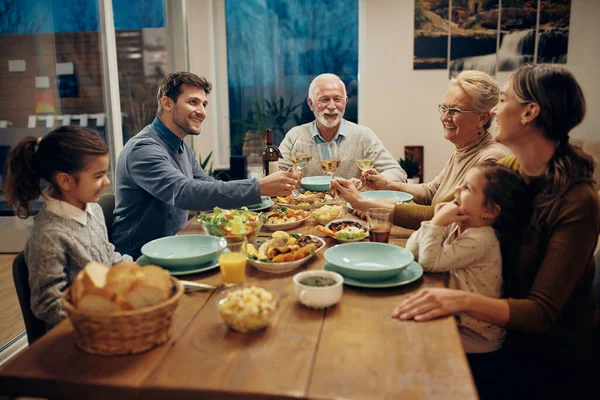 Happy Multi Generation Family Toasting Wine Meal Dining Room — Zdjęcie stockowe