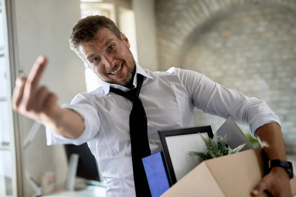 Displeased Businessman Showing Middle Finger Camera Losing His Job Office — Φωτογραφία Αρχείου