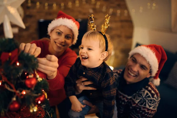 Joyful Little Boy His Parents Having Fun Together Decorating Christmas — ストック写真