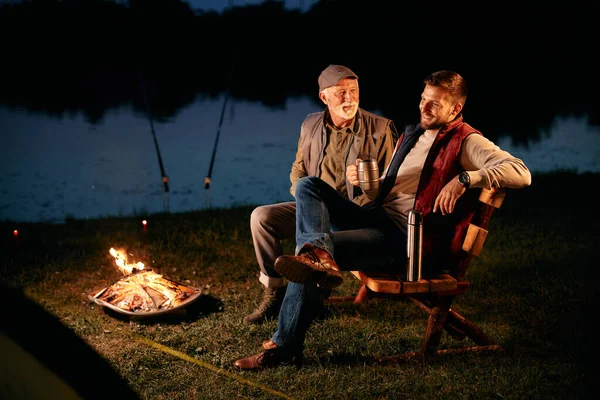 Happy Man His Father Enjoying Bonfire While Fishing Camping Nature — ストック写真