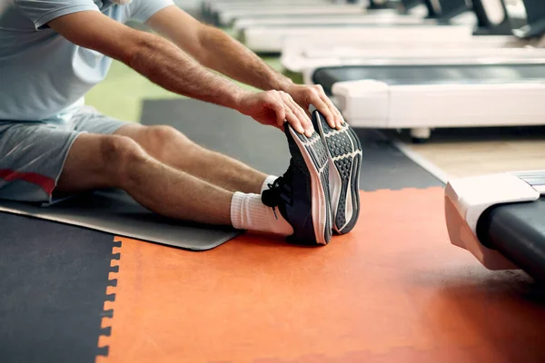 Unrecognizable Mature Sportsman Doing Relaxation Exercise Stretching His Legs Floor — ストック写真