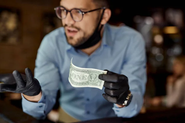 Close Waiter Holding One Dollar Bill Tip Feeling Disappointed While Obrazy Stockowe bez tantiem