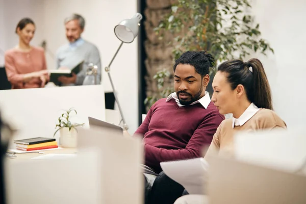 African American Businessman Reading Mail Laptop Female Asian Coworker While — Foto de Stock