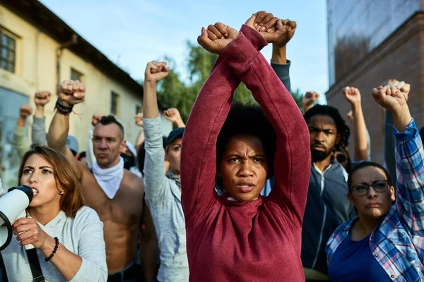 Black Woman Clenched Fists Her Head Protesting Group People Streets — Stock Fotó