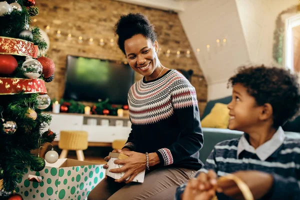 Happy Black Mother Son Communicating While Preparing Christmas Decorating Home — Foto de Stock