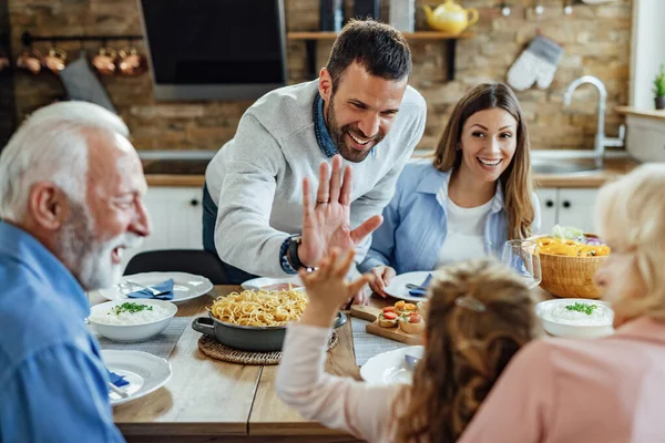 Happy Man Having Fun While Giving High Five His Daughter — Foto Stock