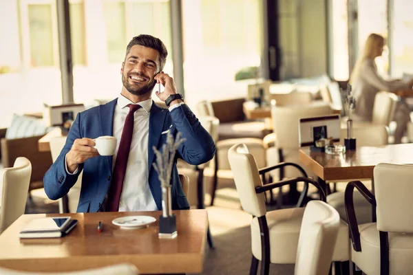 Happy Businessman Talking Smart Phone While Having Cup Coffee Cafe — Stockfoto