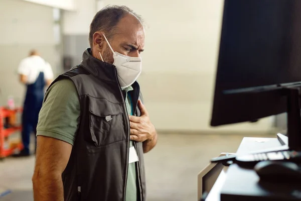 Repairman Protective Face Mask Holding His Chest Pain While Working — Stock fotografie