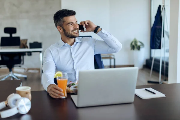 Happy Male Entrepreneur Taking Lunch Break Talking Mobile Phone Office — Stock Fotó