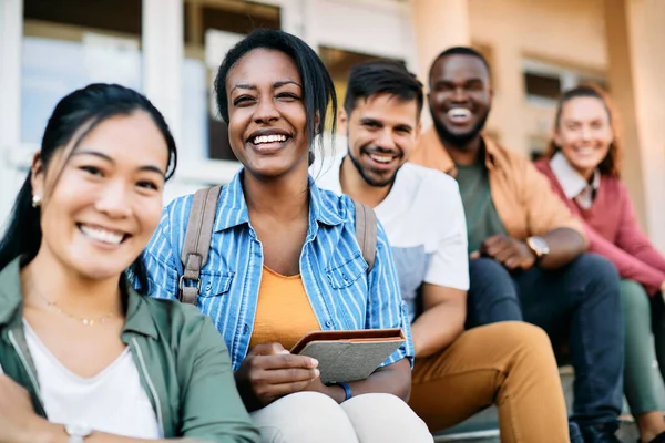 Happy African American Student Her Friends Sitting Front University Looking —  Fotos de Stock