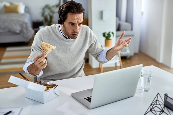 Young Distraught Businessman Reading Problematic Mail While Working Laptop His — Stockfoto