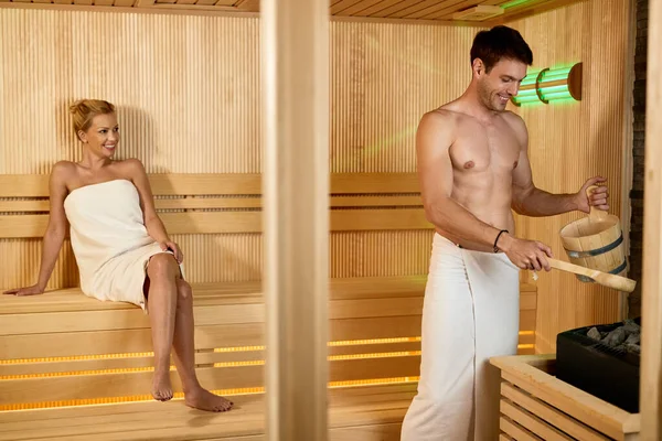 Happy Couple Enjoying Together Sauna Wellness Center Focus Man — стоковое фото