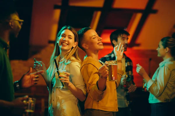 Carefree Women Dancing While Drinking Having Fun Night Out Club — Foto de Stock