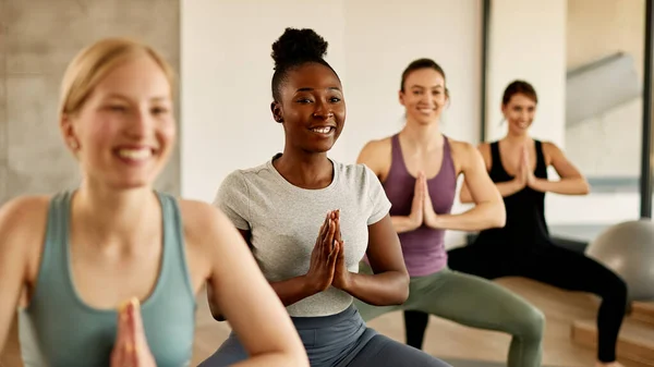 Group Athletic Women Hands Clasped Doing Yoga Exercises Health Club — Fotografia de Stock