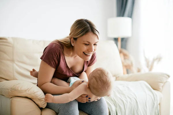 Happy Mother Talking Her Baby Boy While Having Fun Him — Foto de Stock