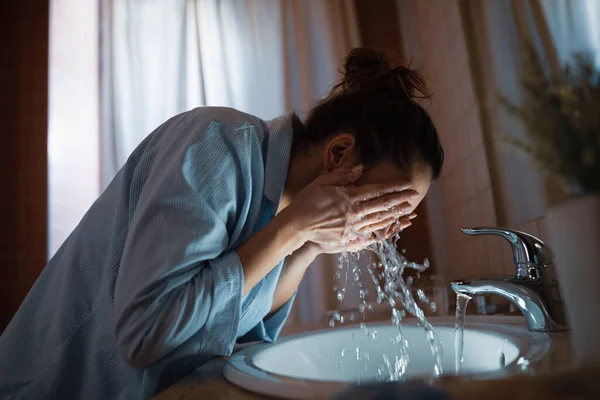 Young Woman Washing Her Face Bathroom Sink — Stockfoto