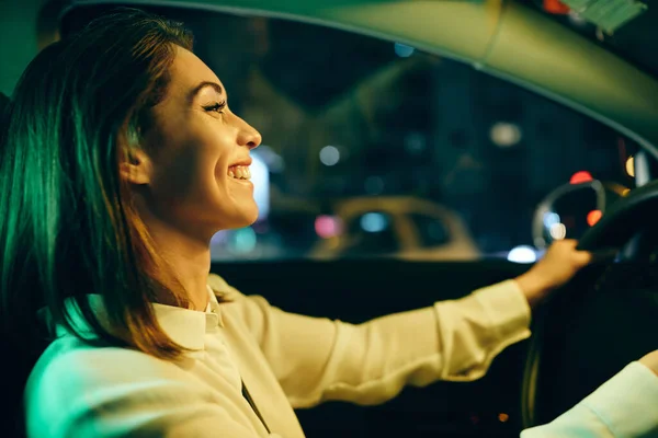 Beautiful Happy Woman Enjoying While Driving Her Car Night — стоковое фото