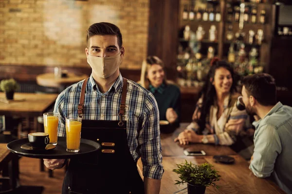Happy Waiter Serving Drinks Wearing Protective Face Mask Cafe Due — 스톡 사진