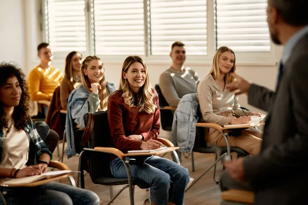 University Students Listening Professor Class Classroom Focus Happy Female Student —  Fotos de Stock