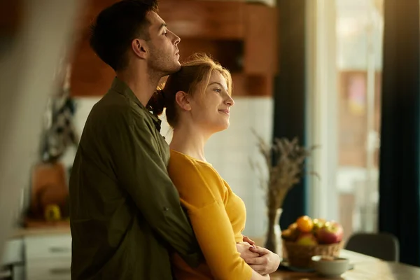 Smiling Woman Day Dreaming While Her Boyfriend Standing Embracing Her — Stock Fotó