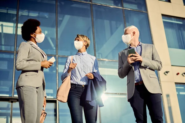 Low Angle View Business Coworkers Protective Face Masks Talking While — Foto Stock