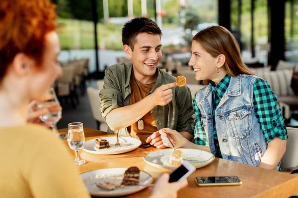 Young Happy Couple Having Fun While Sharing Dessert Cafe — Photo