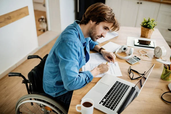 High Angle View Young Businessman Wheelchair Doing Paperwork While Working —  Fotos de Stock