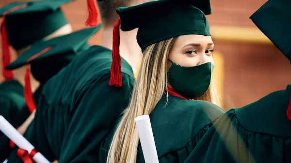 Group Students Graduation Day Focus Female Graduate Wearing Face Mask — Foto Stock