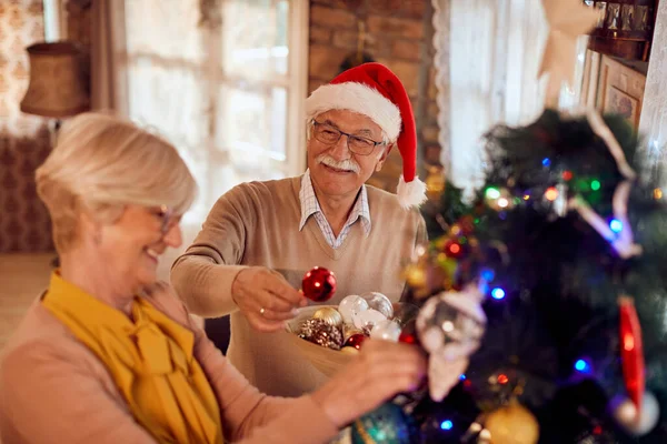 Happy Mature Man His Wife Decorating Christmas Tree Together Home — Photo
