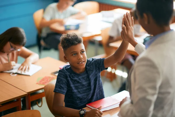 Black Elementary Student Giving High Five His Teacher Class School — Stock Fotó