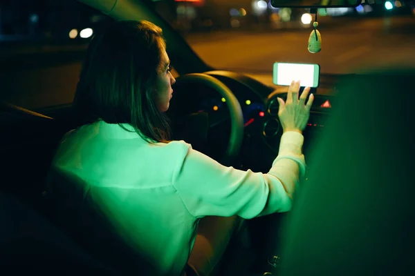 Rear View Woman Using Navigation Software Smart Phone While Driving — 图库照片